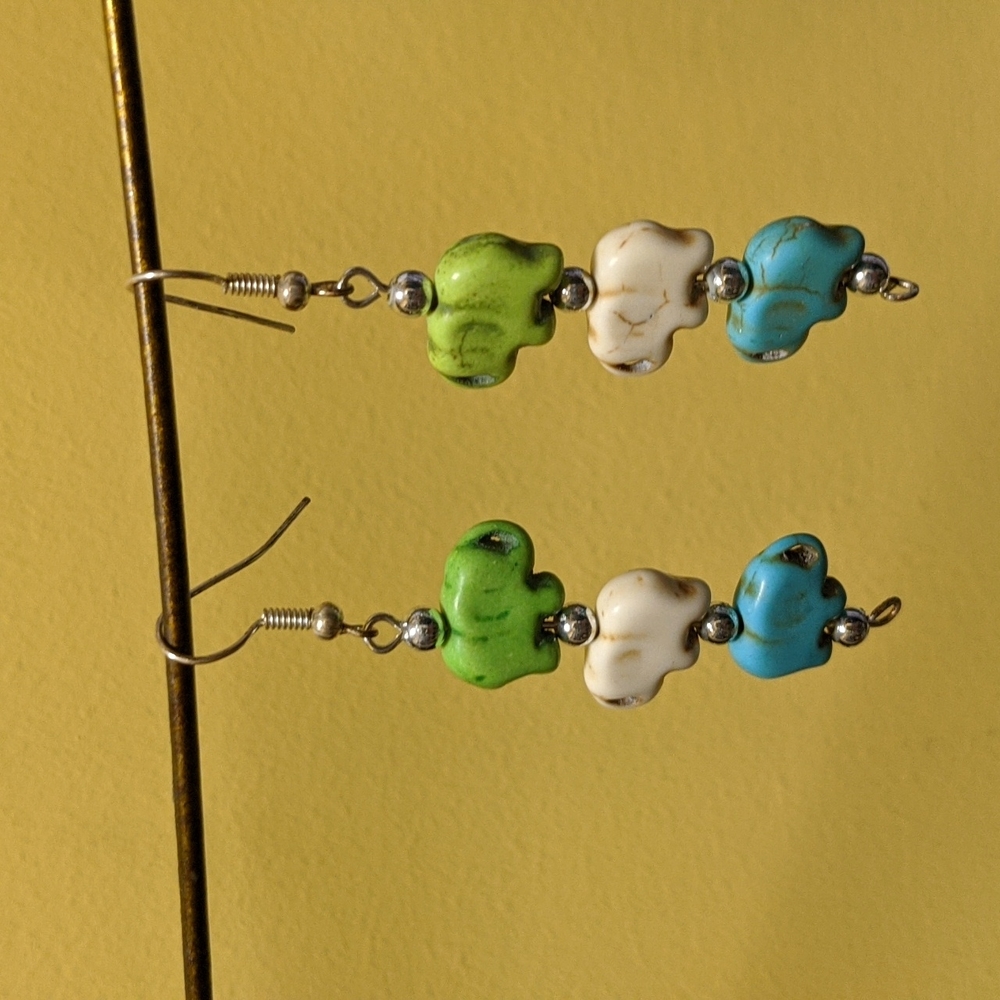 fun green cream and blue elephant earrings